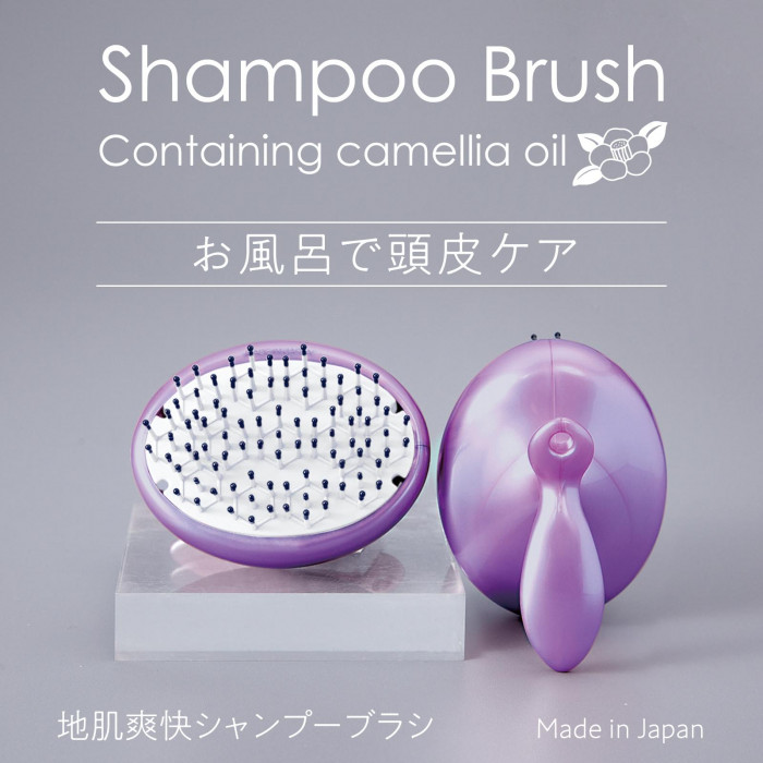 先玉に椿オイルを含浸させたシャンプーブラシで頭皮ケア